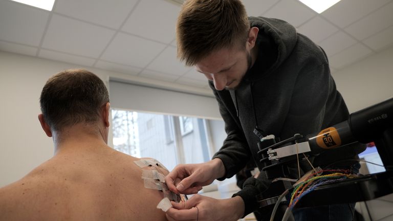 Trainer Yaroslav Patsukevych attaching Oleksandr Solomiany's prosthetic limb
For Stuart Ramsay VT on Ukraine prosthetic limbs