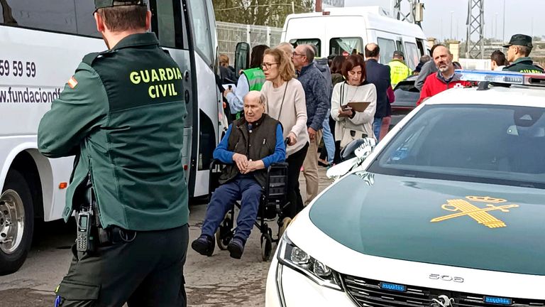 Residents are moved out of the nursing home following the fire.
Pic: AP