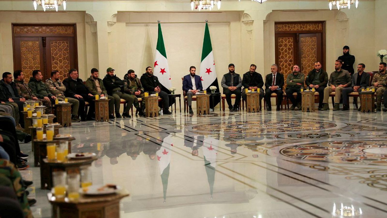 Some Syrian rebel factions agree to dissolve under new leadership - but fighting continues in north