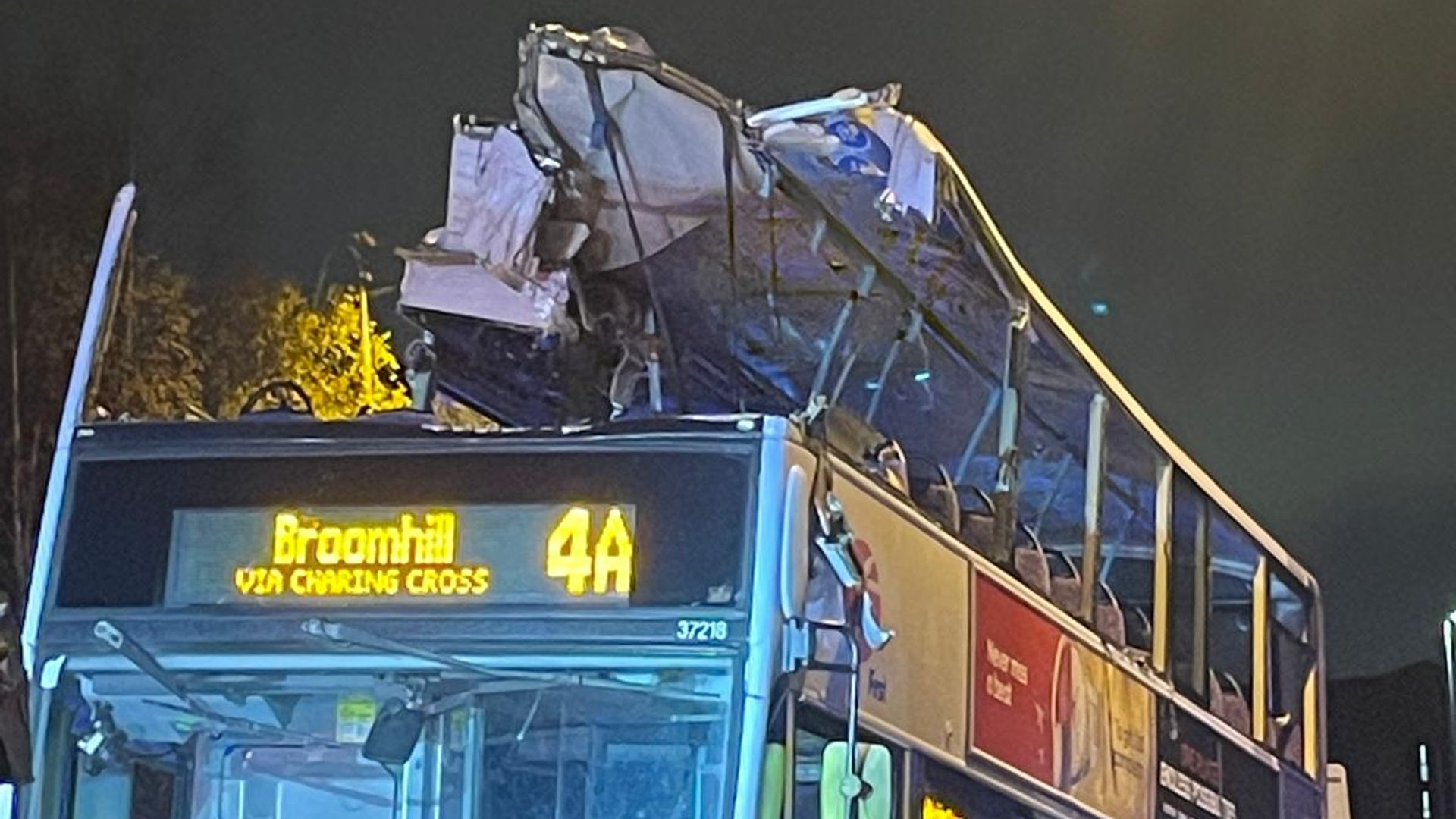 Eight injured after double decker bus hits bridge and roof rips off