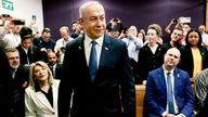 Israeli Prime Minister Benjamin Netanyahu arrives to attend his hearing.
Pic: AP