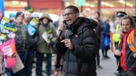 Daniel Kebede general secretary of the National Education Union speaks to members holding an 'A Christmas Carol' themed rally outside Rachel Reeves' office in Leeds, as sixth form college teachers in England continue strike action into January over a pay dispute. Picture date: Friday December 13, 2024.
