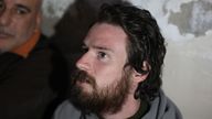 Syrian opposition forces help US citizen Travis Timmerman who was found by residents in the town of Dhiyabiya
Pic: EPA-EFE/Shutterstock