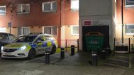 Police officers attend the scene in Shirley Road in Stratford, east London, where a man died after being fatally injured by a dog. Pic: PA