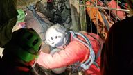Pic: Soccorso Alpino/AP

This image released Monday, Dec. 19, 2024 by the Italian Soccorso Alpino (Alpine Rescue) shows the final rescue operation of Ottavia Piana, a caver blocked in a deep inside the Bueno Fonteno cave, near Bergamo, Italy, after falling some 5 meters (16 feet) Saturday evening during an expedition. (Soccorso Alpino via AP )