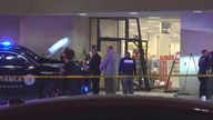 This image taken from video provided by KCEN-TV shows police responding after a man drove a vehicle into a JCPenney at a shopping mall Saturday, Dec. 21, 2024, in Killeen, Texas. (KCEN-TV via AP)