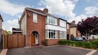 Ely, Cambridgeshire, England - June 20 2018: Typical semi detached bay fronted suburban estate house with driveway providing off road parking