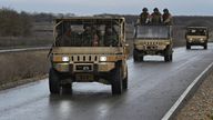 Russian service members ride military buggies during combat training at a firing range in Krasnodar. Pic: Reuters