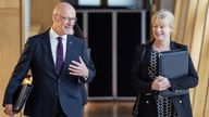 First Minister of Scotland John Swinney and Shona Robison (right) arrive for First Minister's Questions at the Scottish Parliament in Holyrood, Edinburgh. Picture date: Thursday May 16, 2024.