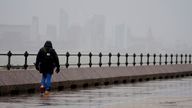 A man walks along The Promenade New Brighton in Liverpool. 
File pic: PA
