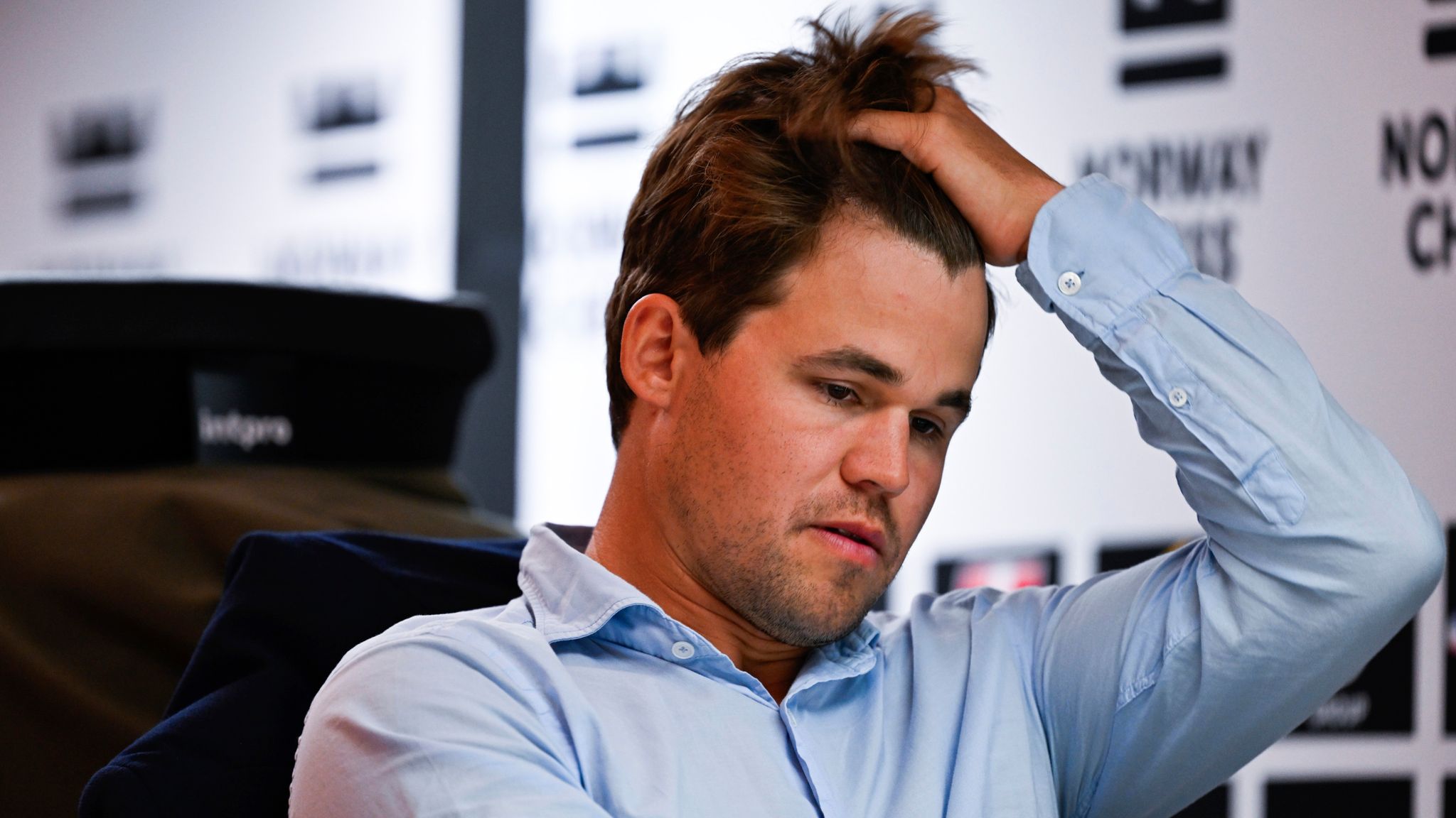 Chess grandmaster Magnus Carlsen rejoins tournament he quit over