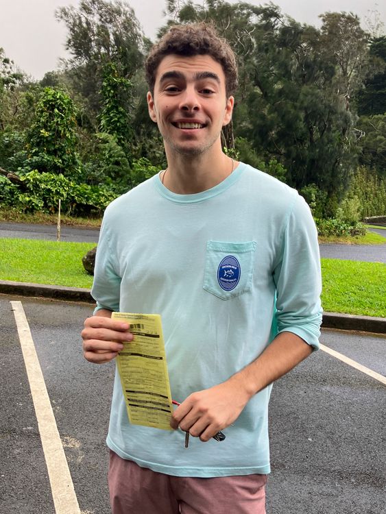 This photo, provided by the Hawaii Dept. of Land and Natural Resources, shows Luigi Mangione, a suspect in the fatal shooting of UnitedHealthcare CEO Brian Thompson, receiving a citation for failing to observe a posted closed-area sign, in Honolulu, Sunday, Nov. 12, 2023. (Hawaii Dept. of Land and Natural Resources via AP)