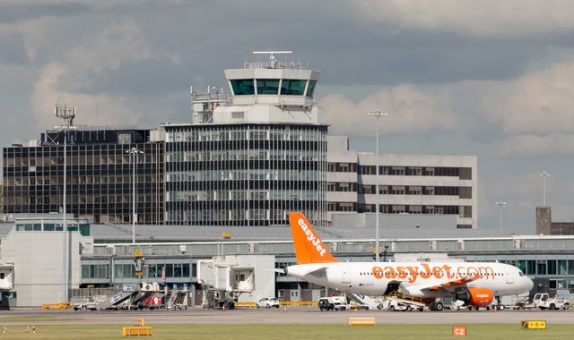 Two men charged over Manchester Airport incident in July