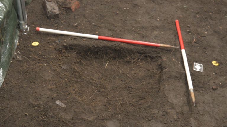 The boy was buried in the garden but his remains weren't found for more than two years. Pic: West Midlands Police