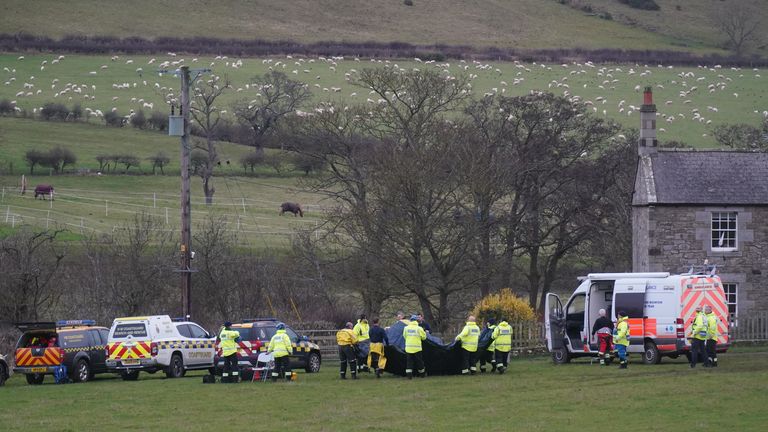 Members of a search and rescue team arrive at River Aln near Alnwick.
Pic: PA