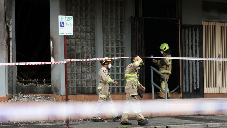 Firefighters at the synagogue. Pic: Reuters