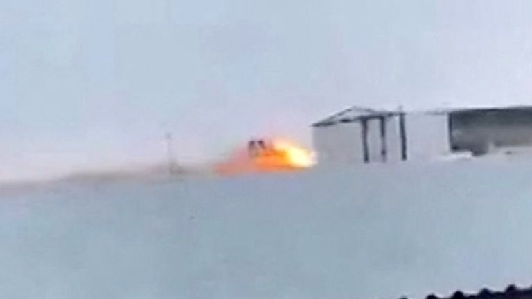 Flames rise after an Azerbaijan Airlines passenger plane crashed near the city of Aktau.
Pic: Reuters TV
