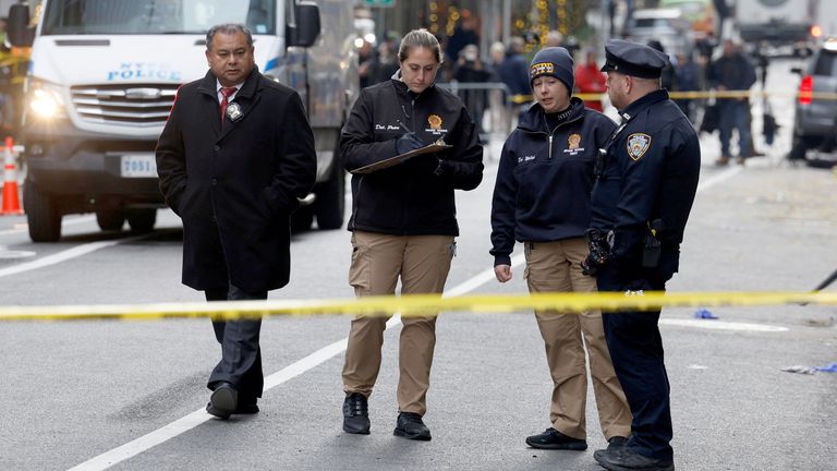 Police officers work near the scene where the CEO of United Healthcare Brian Thompson was reportedly shot and killed.
Pic: Reuters