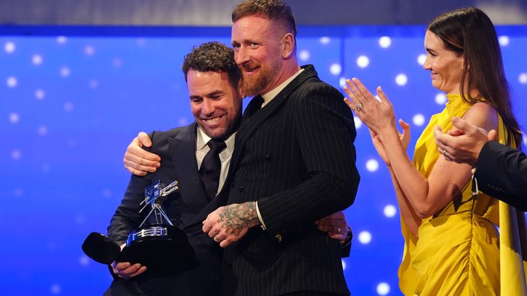 Sir Bradley Wiggins presented Cavendish with the lifetime achievement award. Pic: PA