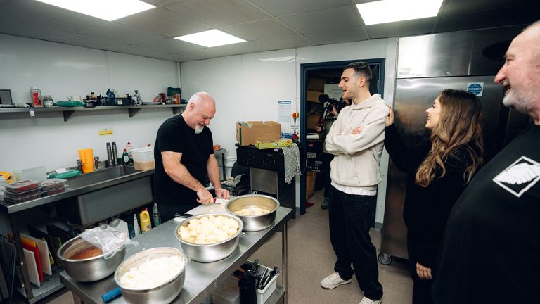 Manchester United star Diogo Dalot in charity's kitchen