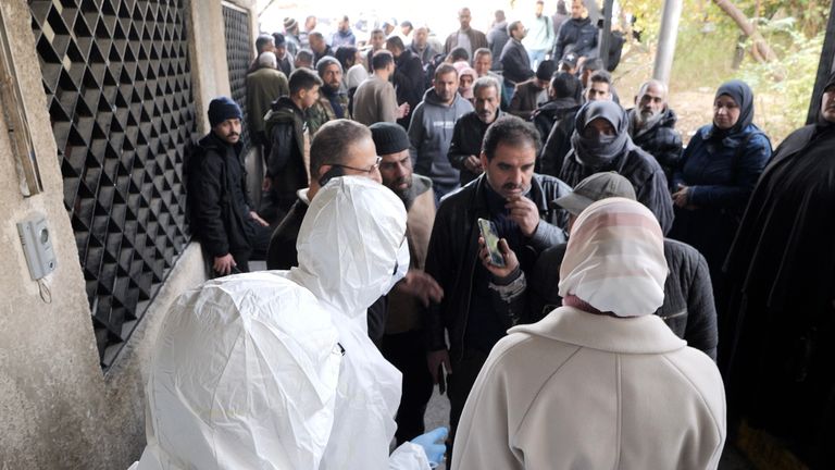 People wait outside a hospital in Damascus, Syria. For Stuart Ramsay piece