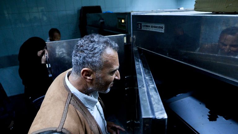 People wait outside an examination room at a hospital in Damascus, Syria. For Stuart Ramsay piece