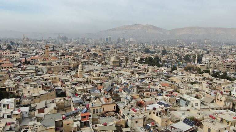 A drone view shows buildings in Damascus, after Syrian rebels ousted President Bashar al-Assad, Syria December 11, 2024. REUTERS/Mahmoud Hassano

