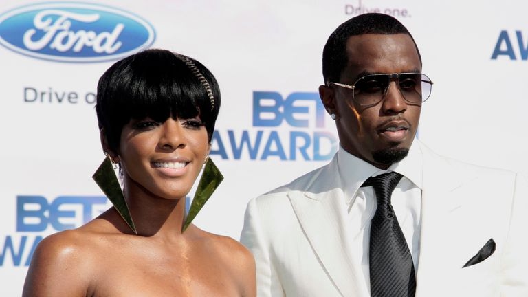 Rap group Diddy Dirty Money, made up of Sean Combs (C), Don Richard (L), and Kalina Harper, arrive at the 2011 BET Awards in Los Angeles, California, June 26, 2011. REUTERS/Jason Redmond (USA - Tags) : entertainment)