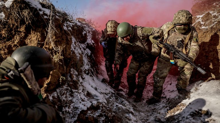 Servicemen of 24th Mechanized brigade take part in a tactical medicine exercise in Donetsk.
Pic: 24th King Danylo Separate Brigade/Reuters
