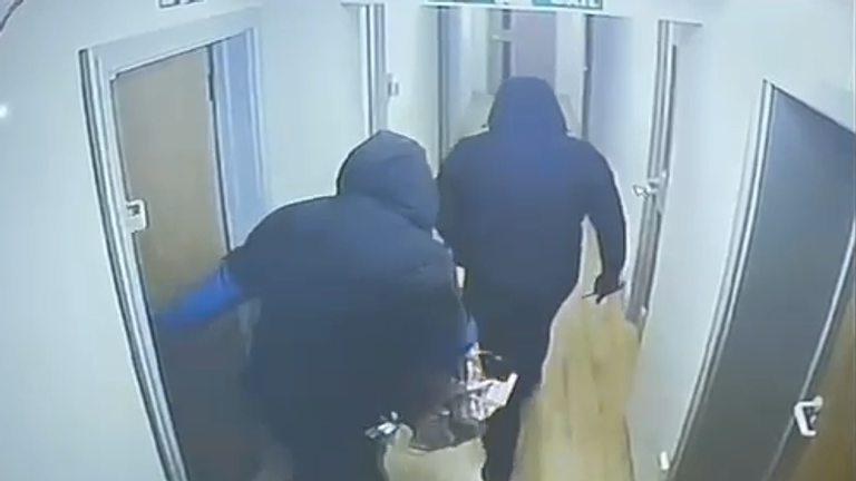 Robber breaking into premises