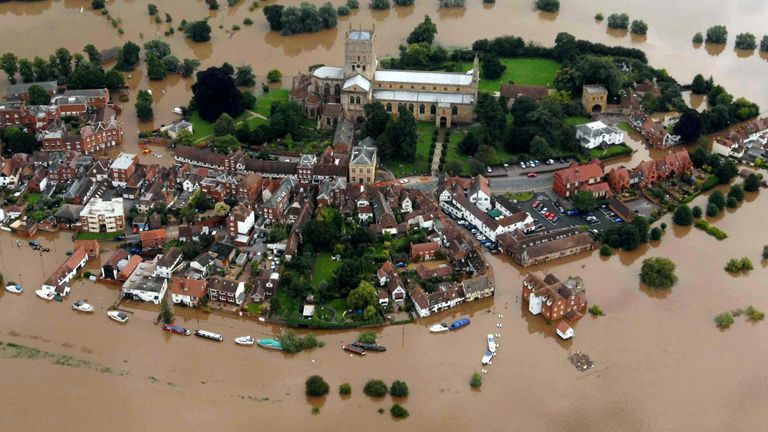 Tewkesbury Abbey in Gloucestershire during 2007 flash flooding. Pic: PA