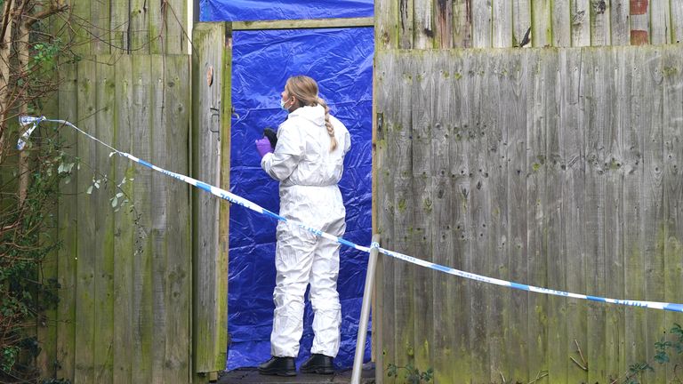 A forensic examiner at the scene on Fownhope Close in Redditch. Photo: PA