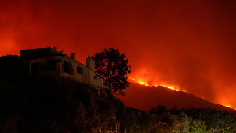 The Franklin Fire approaches Pepperdine University in Malibu, Calif., Tuesday, Dec. 10, 2024. (AP Photo/Jae C. Hong)