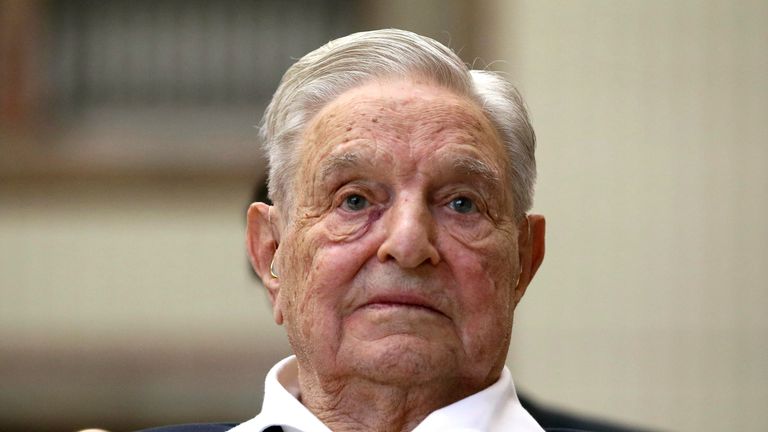 FILE - George Soros, Founder and Chairman of the Open Society Foundations, looks before the Joseph A. Schumpeter award ceremony in Vienna, Austria, Friday, June 21, 2019. The major philanthropy, Open Society Foundations, has committed $50 million to increase civic engagement among women and youth over the next three years as part of its strategy to support democracy in the U.S. (AP Photo/Ronald Zak, File)