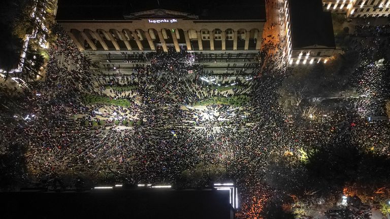 FILE - Demonstrators rally outside the parliament's building to protest the government's decision to suspend negotiations on joining the European Union in Tbilisi, Georgia, on Nov. 29, 2024. (AP Photo/Zurab Tsertsvadze, File)