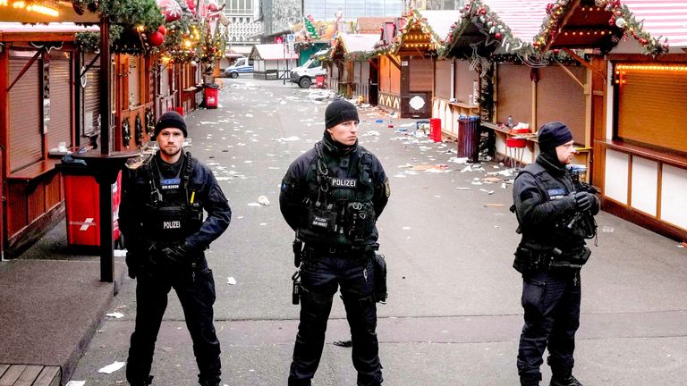 Policemen guard a Christmas Market in Magdeburg, Germany, yesterday. Pic: AP