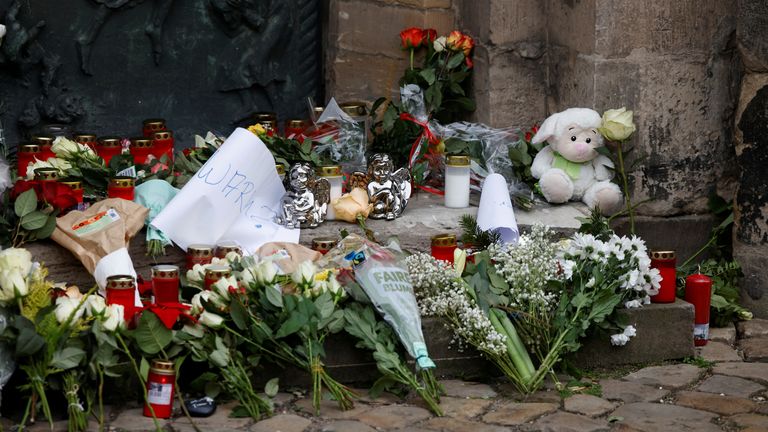 Flowers left near the scene. Pic: Reuters