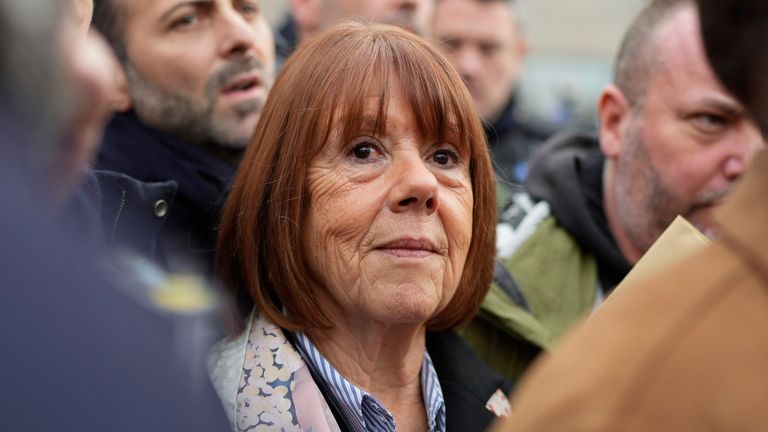 Gisele Pelicot leaves the Avignon courthouse, southern France, Thursday, Dec. 19, 2024. (AP Photo/Lewis Joly)