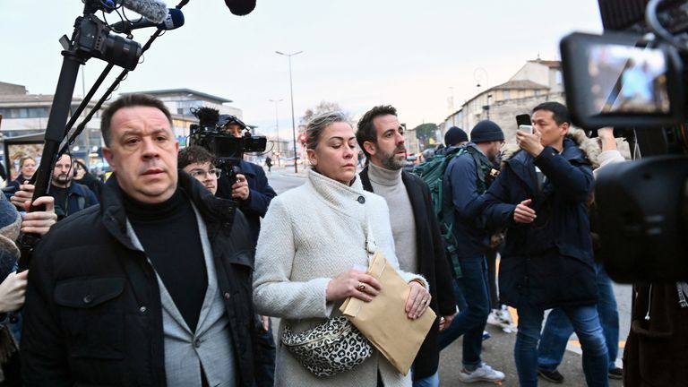 Caroline Darian, David and Florian, the children of Frenchwoman Gisele Pelicot, the victim of an alleged mass rape orchestrated by her then-husband Dominique Pelicot at their home in the southern French town of Mazan, arrive to attend the verdict in the trial for Dominique Pelicot and 50 co-accused, at the courthouse in Avignon, France, December 19, 2024. REUTERS/Alexandre Dimou