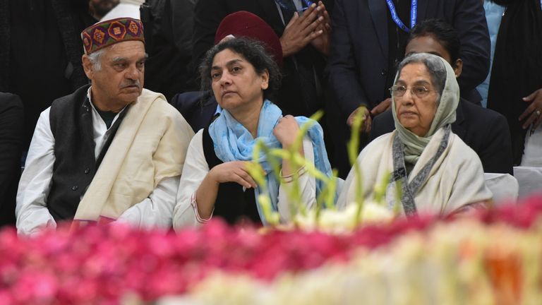 Gursharan Kaur (right), wife of Mr Singh, attends his funeral. Pic: AP Photo