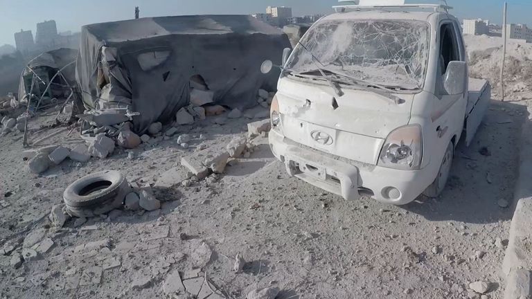 A view of a damaged vehicle in the aftermath of what the White Helmets say is a strike, in Idlib, Syria, released December 1, 2024, in this still image taken from a handout video. The White Helmets/Handout via REUTERS