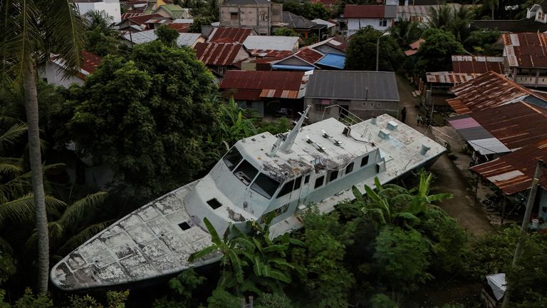 A coast guard ship that was carried about five kilometres inland to the city centre of Banda Aceh during the tsunami. Pic: Reuters