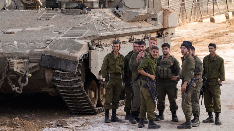 Israeli soldiers near the so-called Alpha Line, which separates the Israeli-annexed Golan Heights from Syria. Image: AP Photo/Matias Delacroix