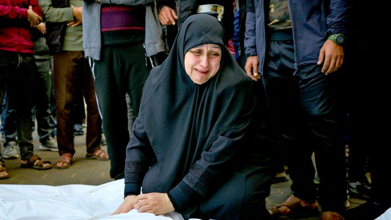 A woman mourns her brother and family after an Israeli strike on the Nuseirat refugee camp.
Pic: AP/Abdel Kareem Hana