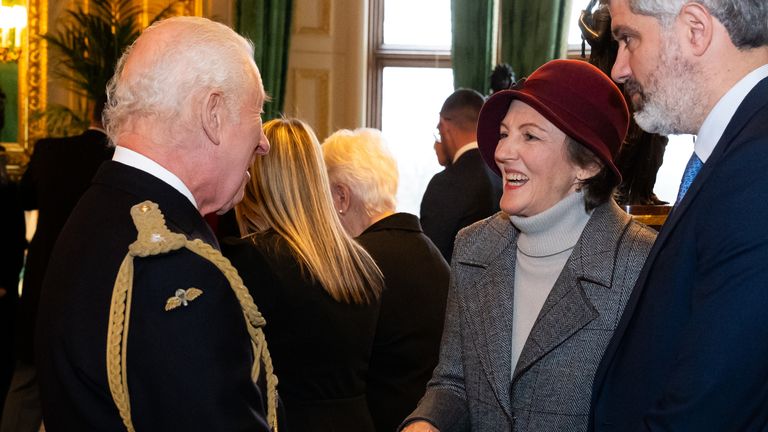 King Charles III presents an Elizabeth Emblem to Jane Houng , for Rebecca Dykes of Foreign Commonwealth and Development Office, during the inaugural presentation ceremony at Windsor Castle, Berkshire.  Aaron Chown/PA Wire