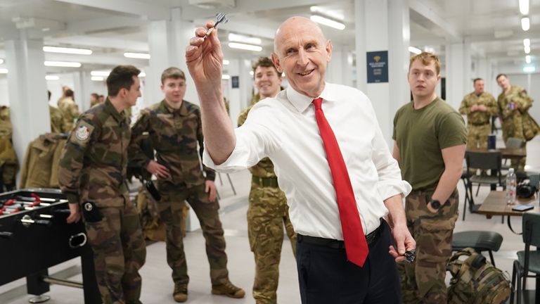 Defence Secretary John Healey playing darts as he meets British personnel at the Tapa military base in Estonia.
Pic: PA