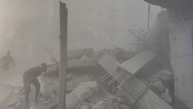 Palestinians conduct a search and rescue operation following the Israeli attack on the courtyard of Kamal Adwan Hospital and its surrounding buildings in Beit Lahia, Gaza.
Pic: Getty Images