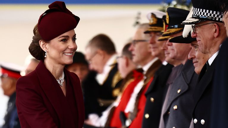 Britain's Catherine, Princess of Wales greets dignitaries including Metropolitan Police Commissioner Mark Rowley, as she arrives ahead of a Ceremonial Welcome for the Emir of Qatar Sheikh Tamim bin Hamad Al Thani and his wife Sheikha Jawaher, at Horse Guards Parade in London, Tuesday Dec. 3, 2024. (Henry Nicholls via AP, Pool)