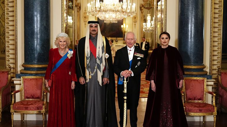 King Charles and Queen Camilla stand with the Emir of Qatar Sheikh Tamim bin Hamad al-Thani and his wife Sheikha Jawaher ahead of the state banquet. Pic: Reuters