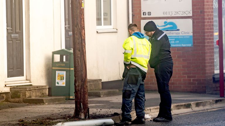 Police officer outside the Old Tree Inn pub on the High Street in Kippax, West Yorkshire.
Pic: PA